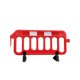 Plastic barrier with reflective strip on a white background
